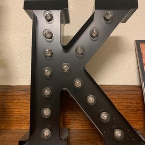 K sign with lights